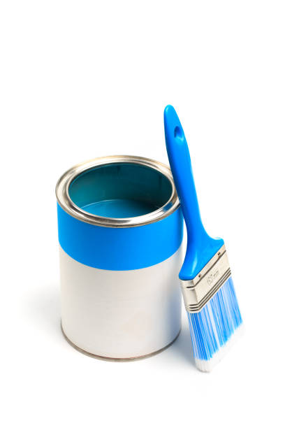 istock Can with blue paint with brush  isolated on white background - Image 1204582355
