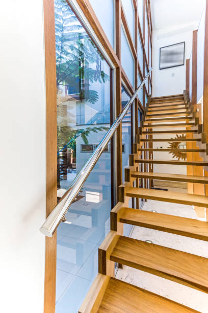 istock Wooden staircase with glass windows 1204583137