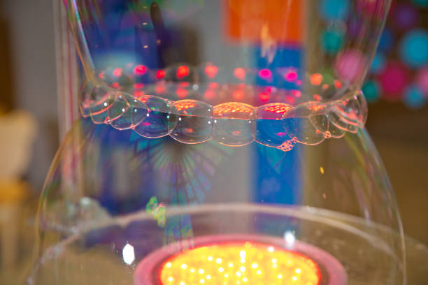 istock Children's party. To burst the soap bubble . Soap bubbles show. 1204583605