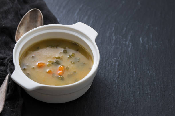 istock vegetable soup in white bowl on ceramic background 1204583625