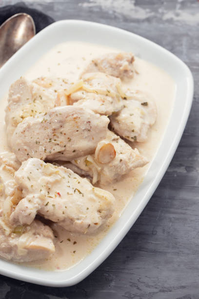 istock chicken with creamy sauce on dish on ceramic background 1204583661