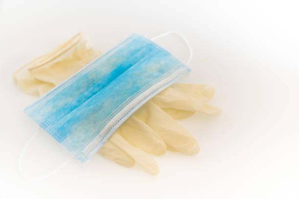 istock Medical disposable gloves and disposable masks 1204585519