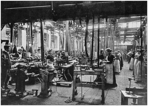 antikes foto des britischen imperiums: frauen arbeiten in fahrradfabrik - fließband fotos stock-grafiken, -clipart, -cartoons und -symbole
