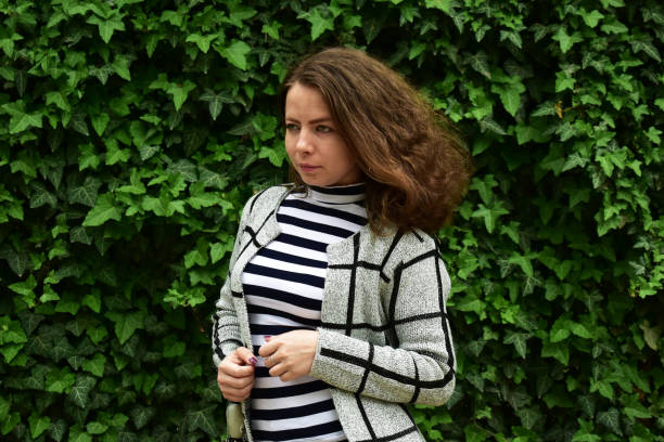 istock Beautiful girl in nature 1204591703