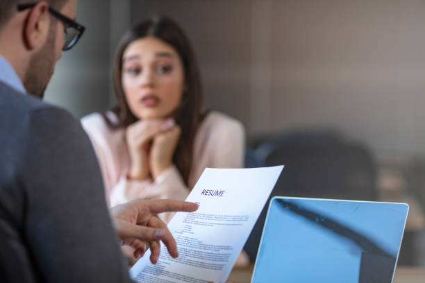 istock Nervous young job applicant wait for recruiters question during interview in office 1204592148