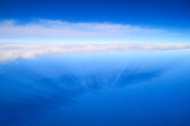 istock The sun shines through the clouds. The view from the plane. 1204594411