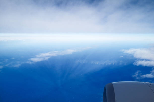 istock The sun shines through the clouds. The view from the plane. 1204594479