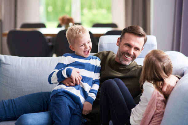 istock Happy dad and his children spending time together 1204594834