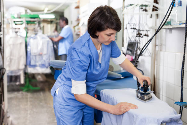 istock Girl ironing in laundry 1204594931