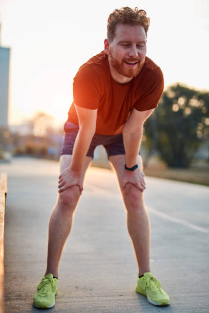 istock Modern young man working out in an urban park. 1204595906