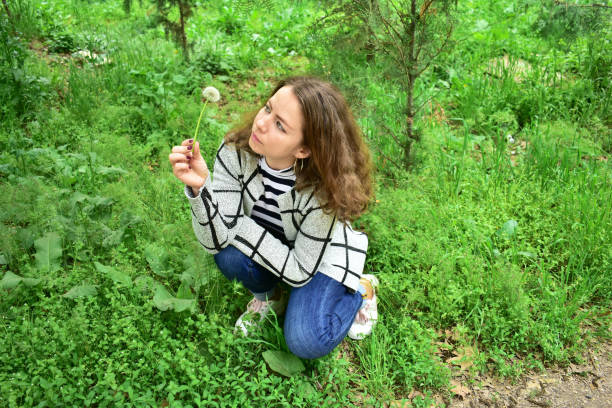 istock Beautiful girl in nature 1204596251