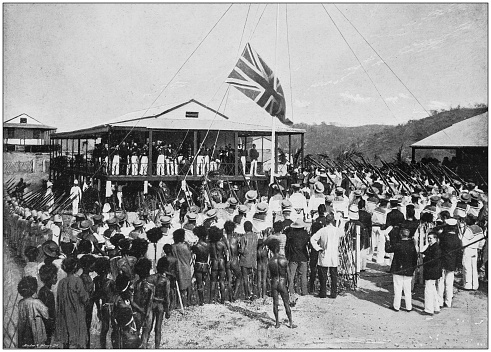 Antique photograph of the British Empire: Hoisting the British flag at Port Moresby, New Guinea