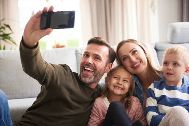 istock Cheerful family took a selfie 1204597221