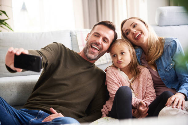 istock Playful family making a selfie 1204598299