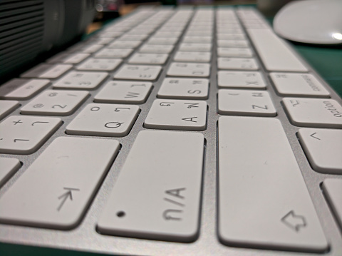 White mouse and white Thai-English keyboard