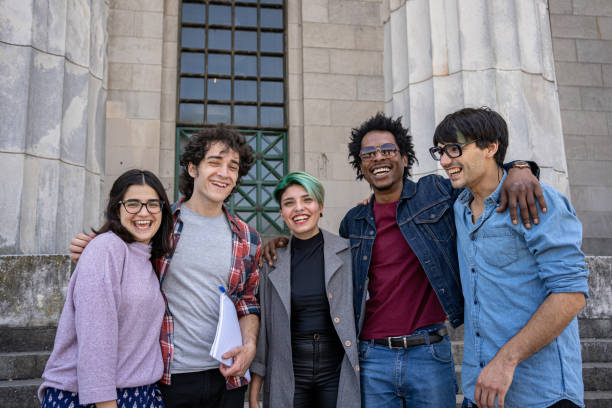 istock Portrait of a beautiful multi-ethnic cheerful student group 1204601074