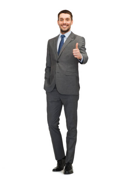 istock handsome buisnessman showing thumbs up 1204603171