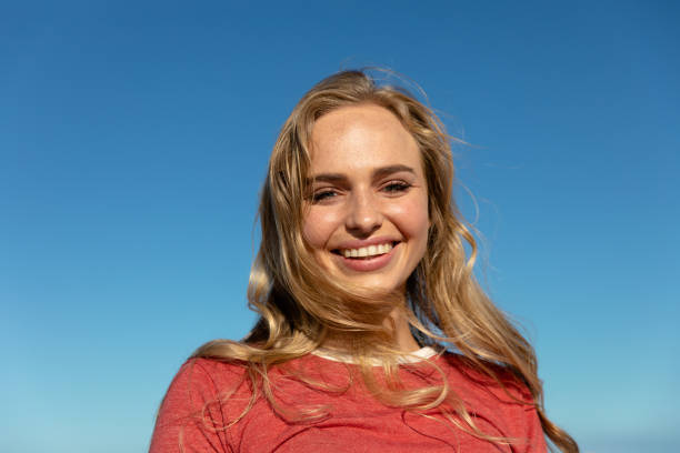 istock Low view happy young woman 1204612431