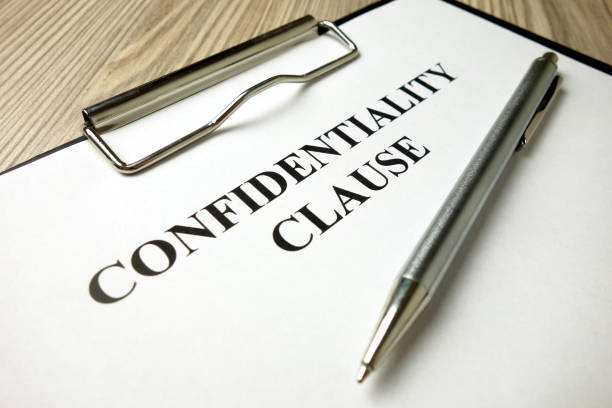 istock Confidentiality clause with pen on desk 1204615807