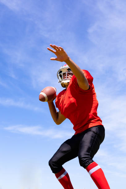 istock Football player with ball 1204616894