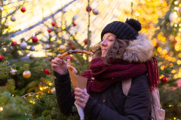 istock Lady eats Christmas cookies at the Red Square in Moscow 1204616996