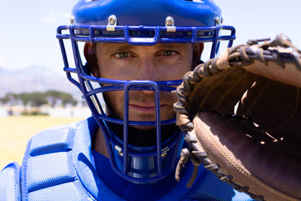 istock Baseball player with ball and glove 1204618445