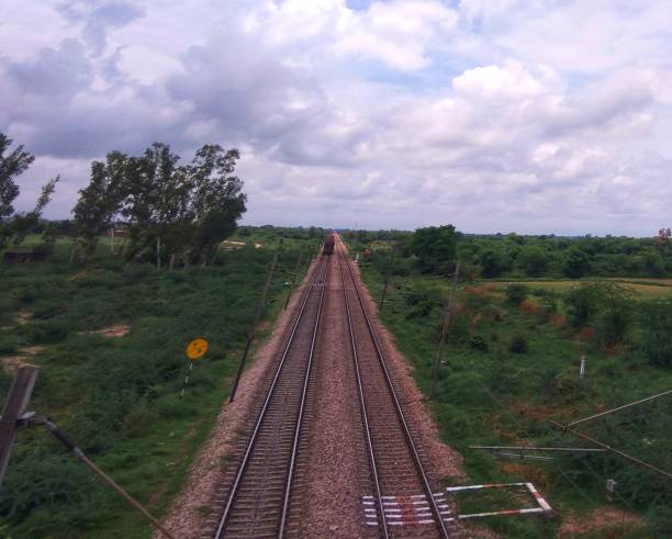 istock Trains and track  goes to infinity 1204618770
