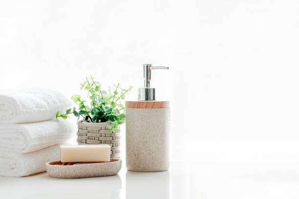istock Clean soft terry towels with soap on white table, copy space. 1204618939