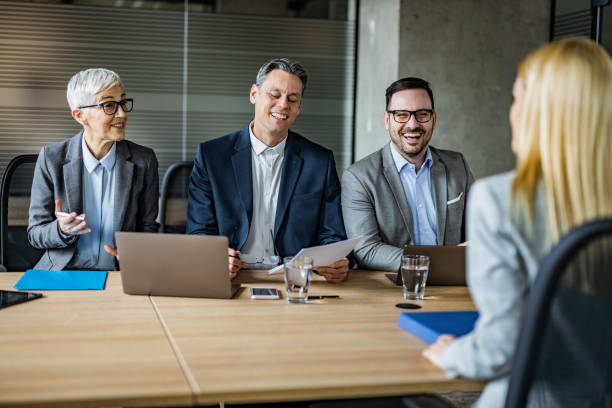 istock Happy human resource team talking to their candidate on a job interview. 1204622269