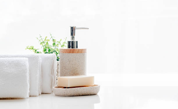 istock Clean soft terry towels with soap on white table, copy space. 1204623095