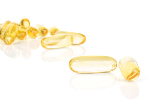 istock Golden fish oil isolated on white 1204624255