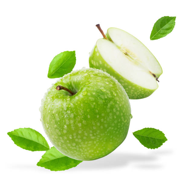 istock Water splashing on Fresh green apple on Green background 1204624944