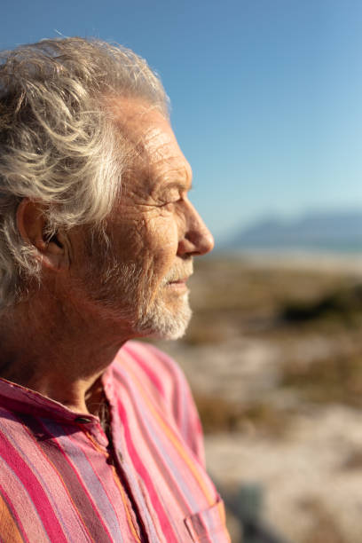 istock Old man enjoying free time 1204626446