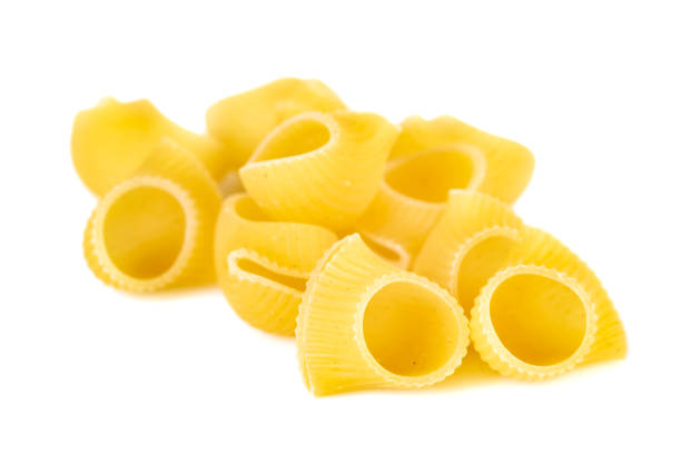 istock Group of macaroni pasta on white background 1204626954