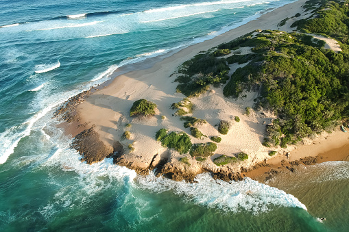 drone shot of a beach on an island in Tofo, Mozambique