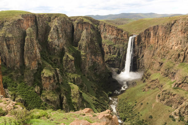 istock stunning waterfall running down a steap canyon 1204632698