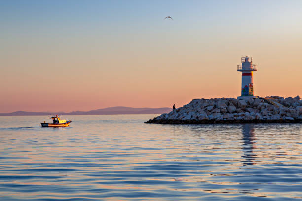 Lighthouse in the town of Kucukkuyu on the Aegean Sea, Turkey