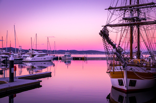 Sail boats at sunset in Victoria Dock in Hobart, Tasmania