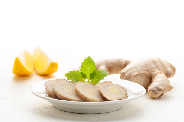 Ginger root is sliced. stock photo
