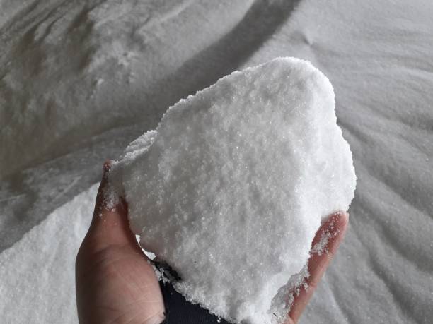 istock chemical fertilizer and hand 1204635239