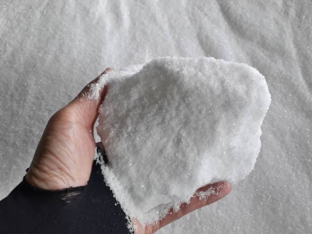 istock chemical fertilizer and hand 1204635323