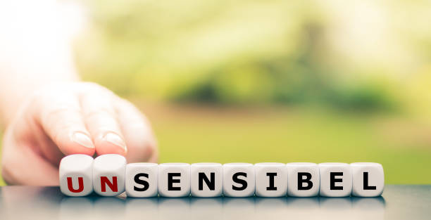 istock Hand turns dice and changes the German word 