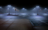 An Empty Parking Lot on a Misty Night