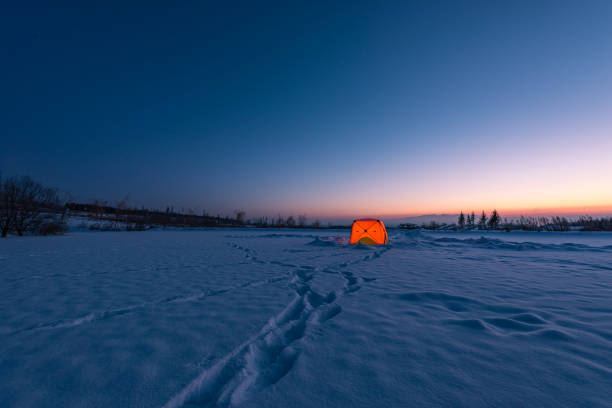istock Tent camping in the snow in winter 1204640074
