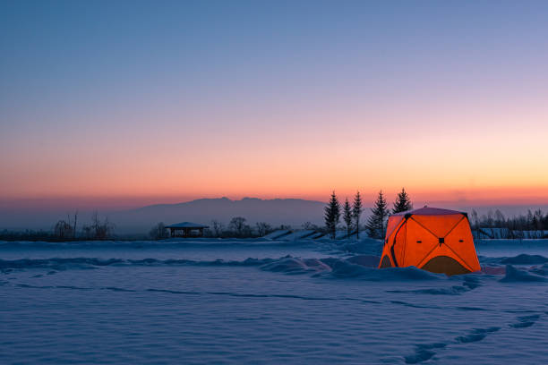 istock Tent camping in the snow in winter 1204640089