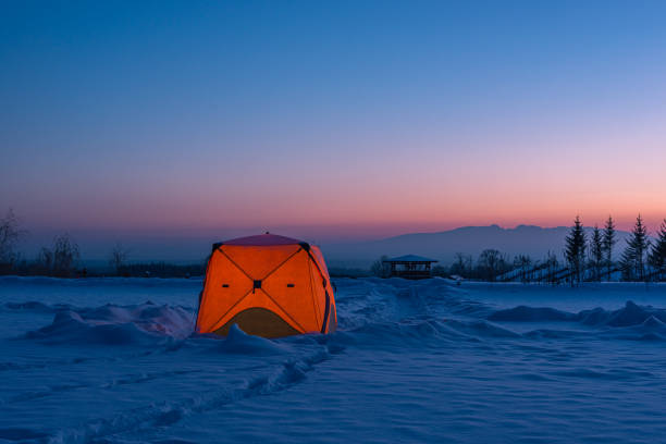 istock Tent camping in the snow in winter 1204640101