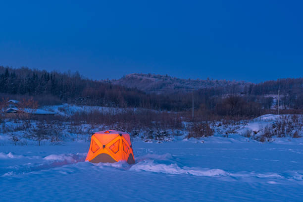 istock Tent camping in the snow in winter 1204640103