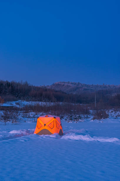 istock Tent camping in the snow in winter 1204640105