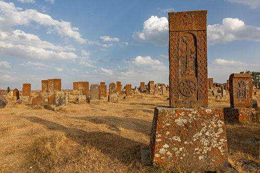 Ancient tombs and headstones in the historical cemetery of Noratus in Armenia.