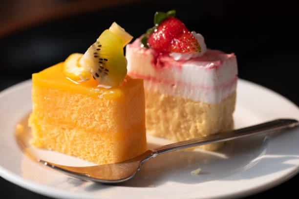 istock Orange cake and Yoghurt ribbon cheese cake 1204642271